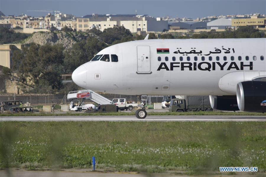 Libyan airplane hijackers surrender, release all hostages