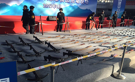 Public security organ destroys illegal guns and knives
