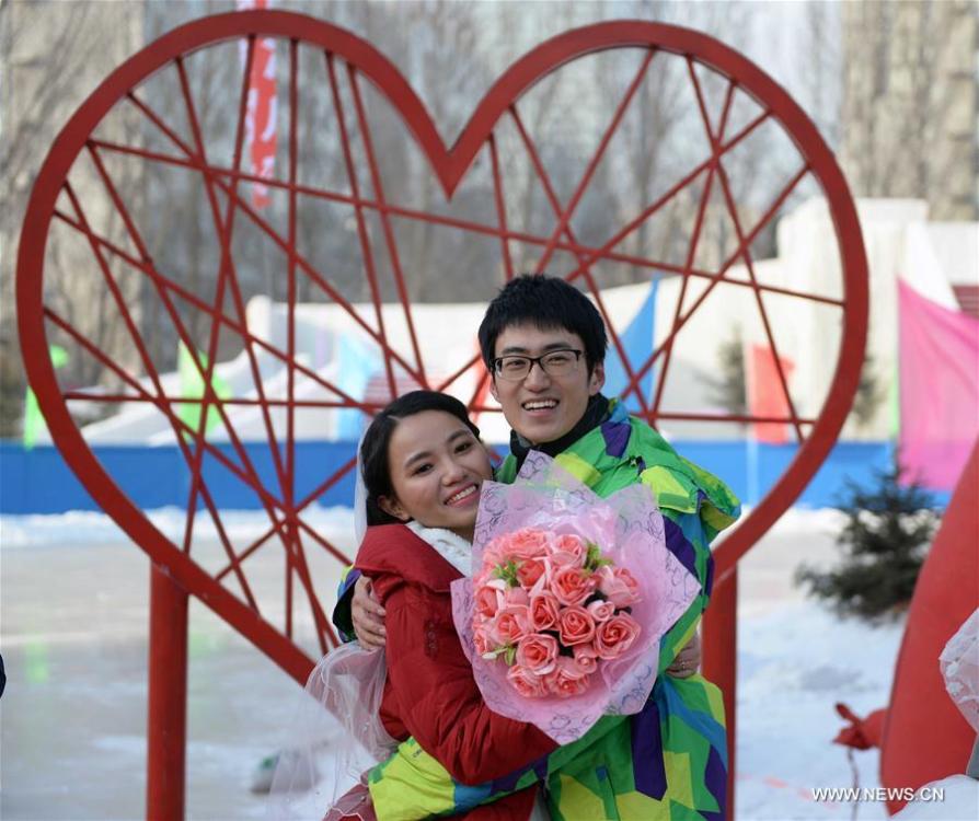 Group wedding ceremony held during Harbin Ice and Snow Festival