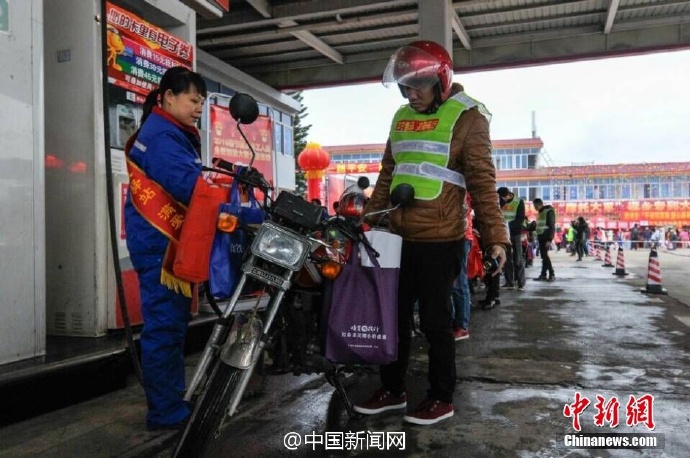 Migrant workers ride home on motorcycles to save money