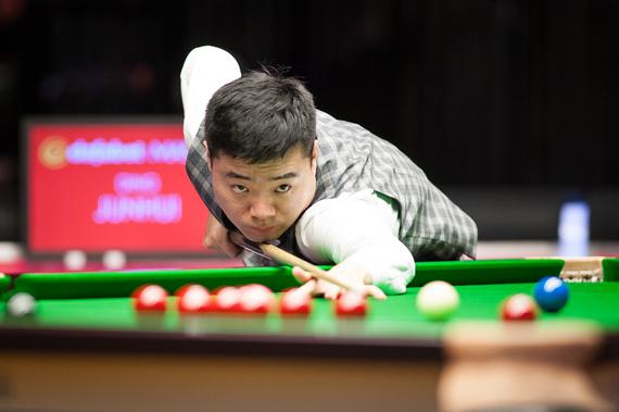 China's Ding wins first match in six years at snooker Masters