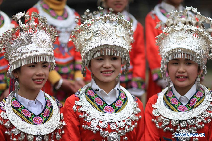 People of Miao ethnic group take part in folk events welcoming spring