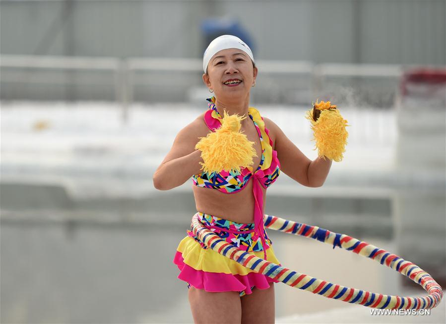 Winter swimmers perform in NE China's Harbin