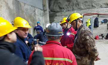 Rescuers continue search for trapped Chinese miners in Albania