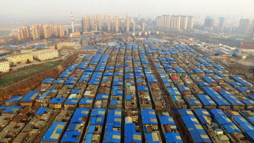 Disappearing Jinan village resembles blue pixels