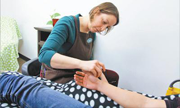 American woman promotes, practices acupuncture for 10 years