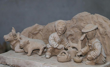 Traditional country life through clay sculpture