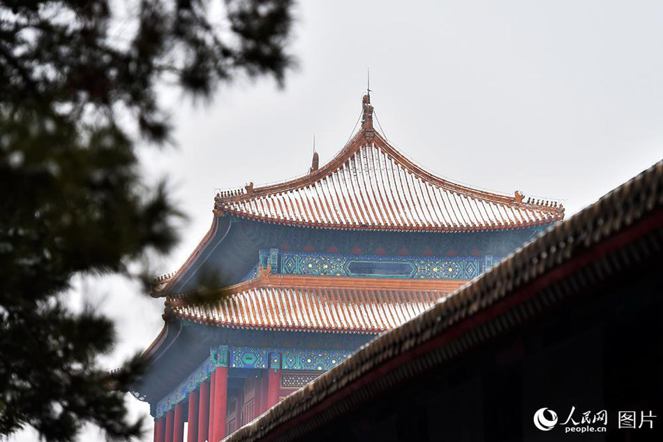 Enjoy the poetic beauty of Palace Museum coated in snow