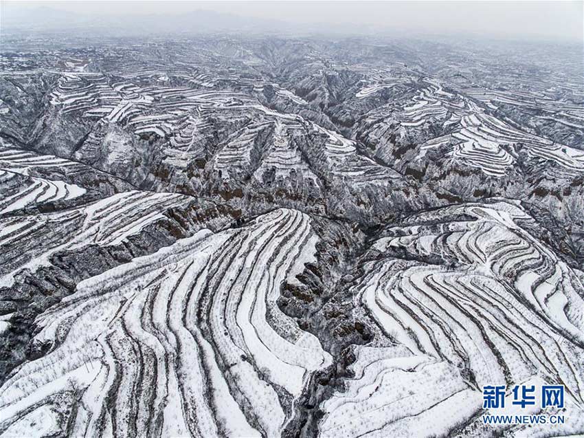 Snow-capped Loess Plateau resembles black-and-white photo
