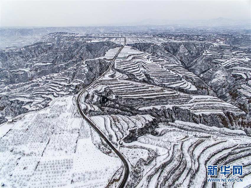 Snow-capped Loess Plateau resembles black-and-white photo
