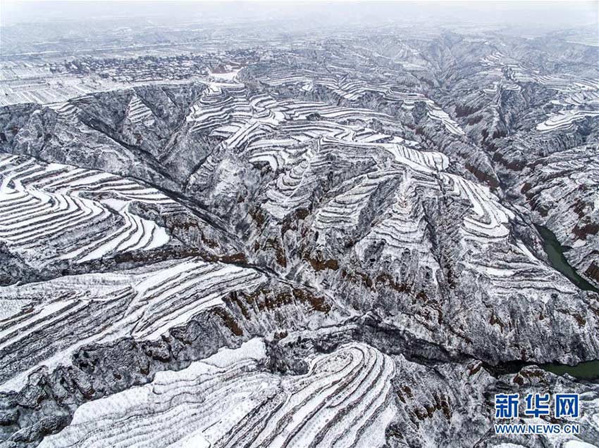 Snow-capped Loess Plateau resembles black-and-white photo