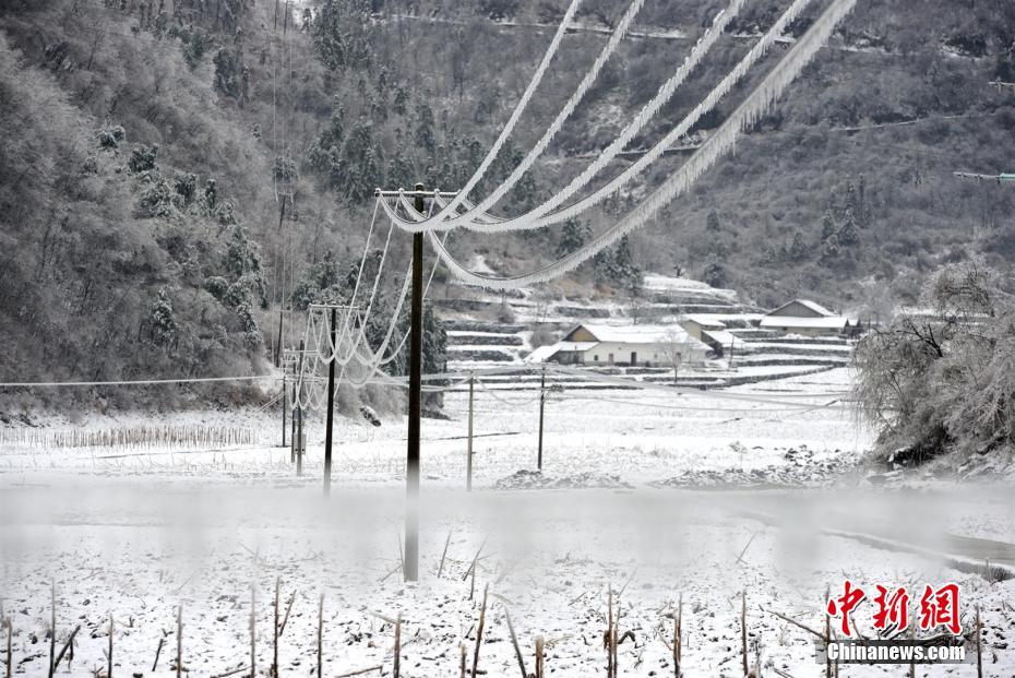 Electric wires covered in icicles near Three Gorges reservoir