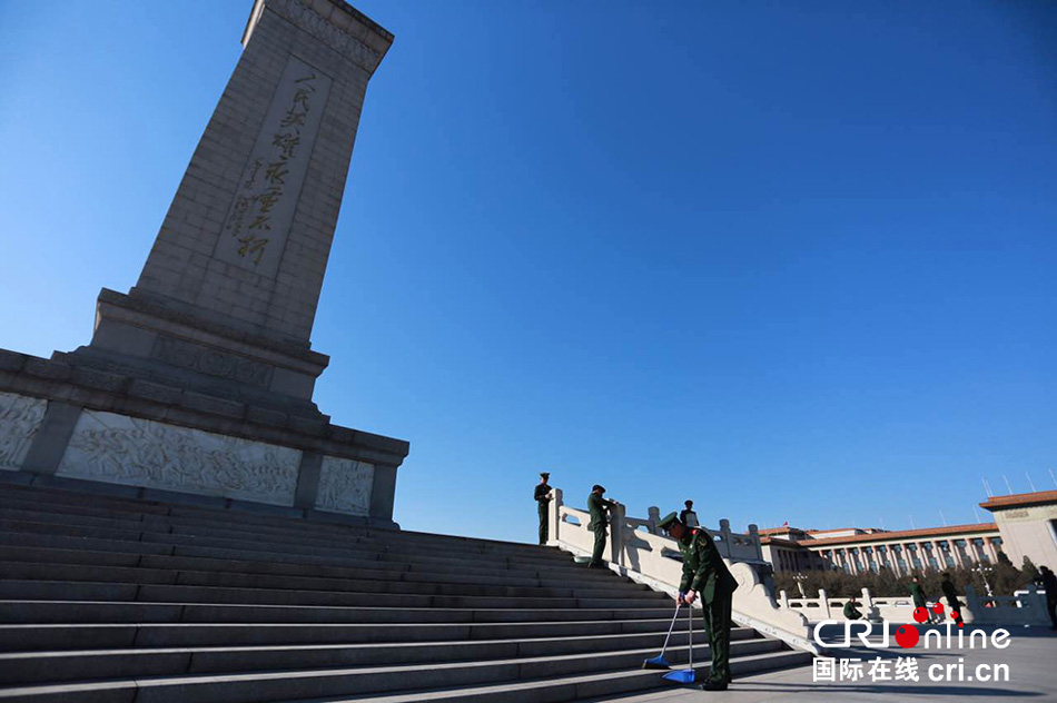 Armed police clean Tiananmen Square for upcoming 'Two Sessions'
