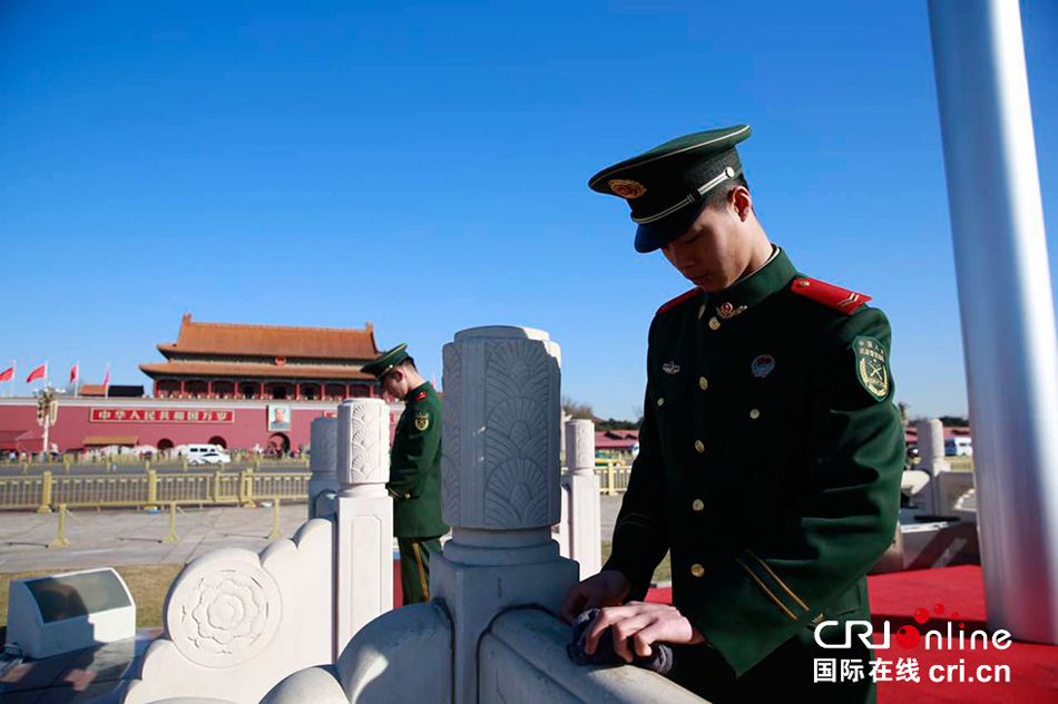 Armed police clean Tiananmen Square for upcoming 'Two Sessions'