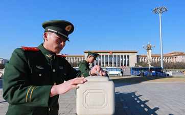 Armed police clean Tiananmen Square for upcoming 'Two Sessions'