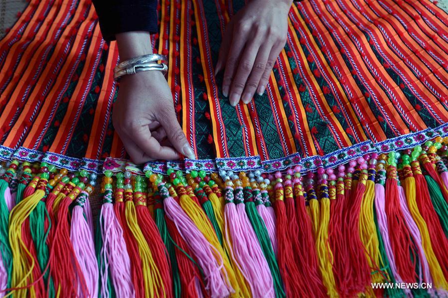 Women from Miao ethnic group learn brocade weaving in SW China