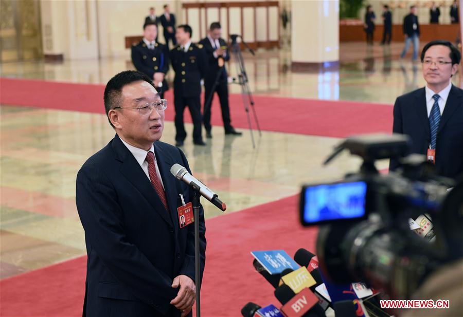 Ministers receive interviews before 2nd plenary meeting of 5th session of 12th NPC