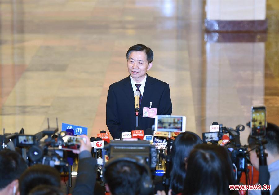 Ministers receive interviews before 2nd plenary meeting of 5th session of 12th NPC