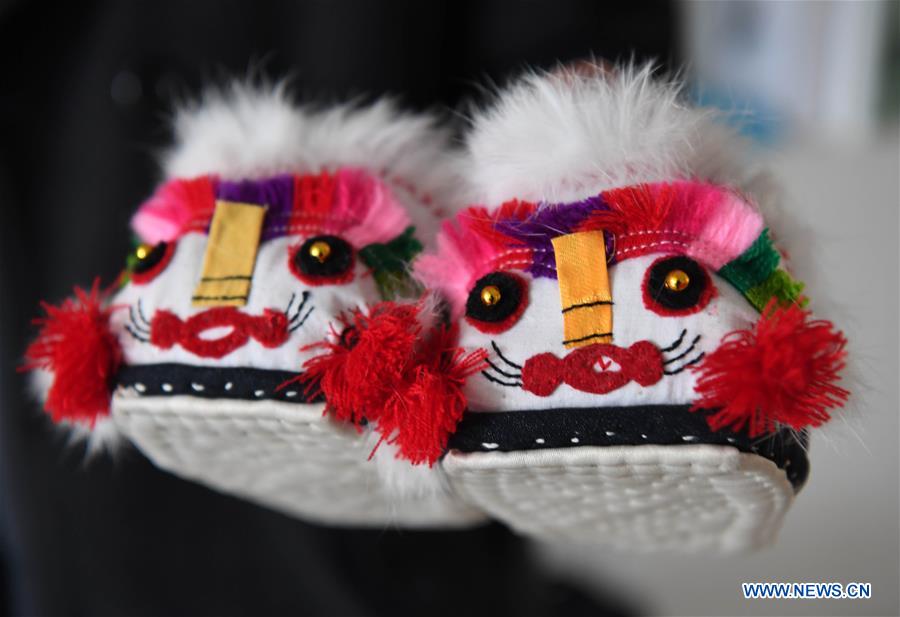 Amazing Chinese folk handicraft: tiger-head shoes