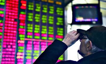 China busts first market manipulation case under Shanghai-HK stock lin