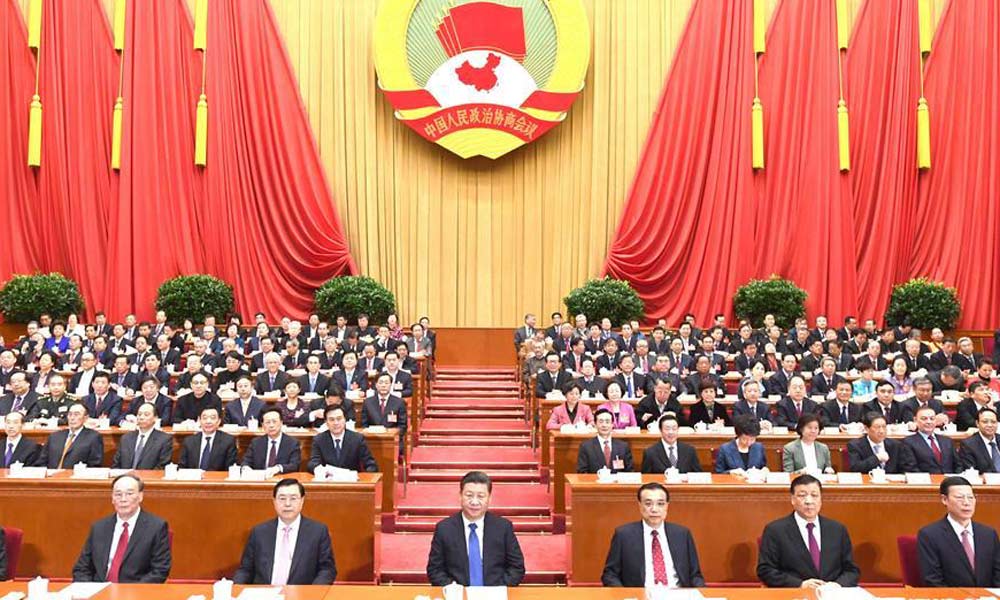 Chinese leaders attend closing meeting of CPPCC annual session