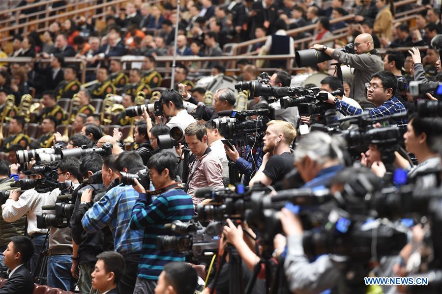 China's national legislature begins closing meeting of annual session