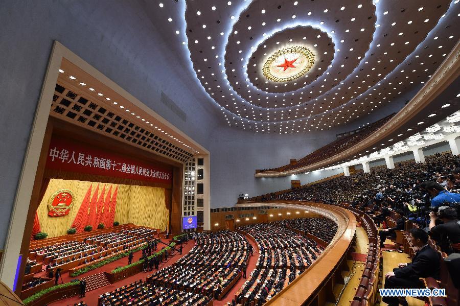 China's national legislature begins closing meeting of annual session