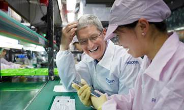 Apple CEO Tim Cook defends globalization during latest Beijing visit