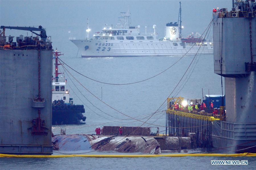 Sunken S. Korean ferry Sewol lifted from sea 3 years after shipwreck