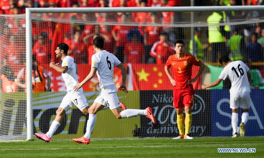 Iran's Mehdi Taremi (1st L, front) celebrates after scoring during the 2018 FIFA World Cup Russia qualification match between China and Iran, in Tehran, Iran, March 28, 2017. Iran won 1-0. (Xinhua/Guo Yong)