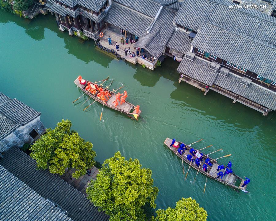 Boat competition held to celebrate Sanyuesan Festival in E China