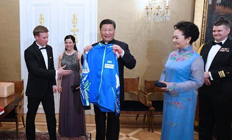 Chinese, Finnish presidents meet winter sports athletes
