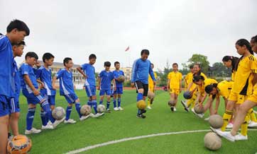 School team of left-behind children finds soccer success, education opportunities
