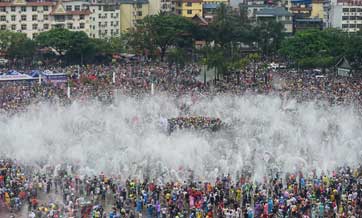 Water-sprinkling festival celebrated in Jinghong City, China's Yunnan