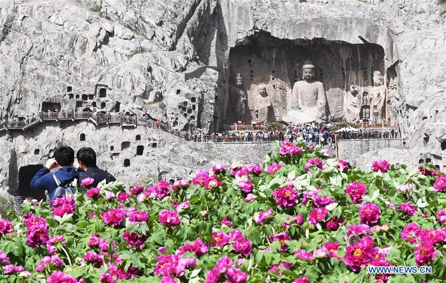 Longmen Grottoes in China's Henan enters into tourist rush season 