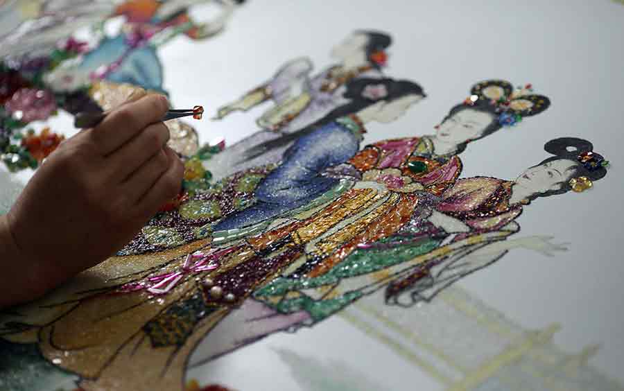 Handicapped woman takes pride in artistry, deft hands