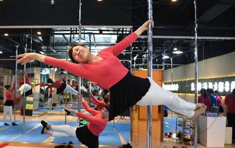 67-year-old woman practices pole dancing