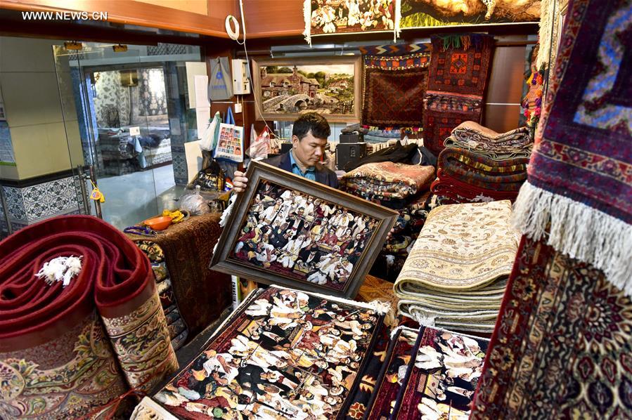 Fraidoun of Afghanistan runs carpet business in China's Xinjiang