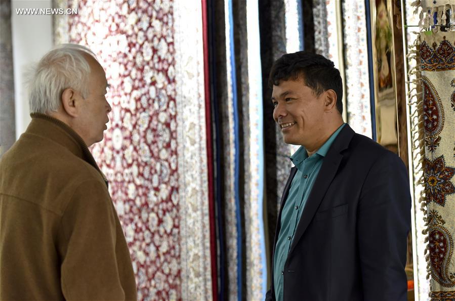 Fraidoun of Afghanistan runs carpet business in China's Xinjiang