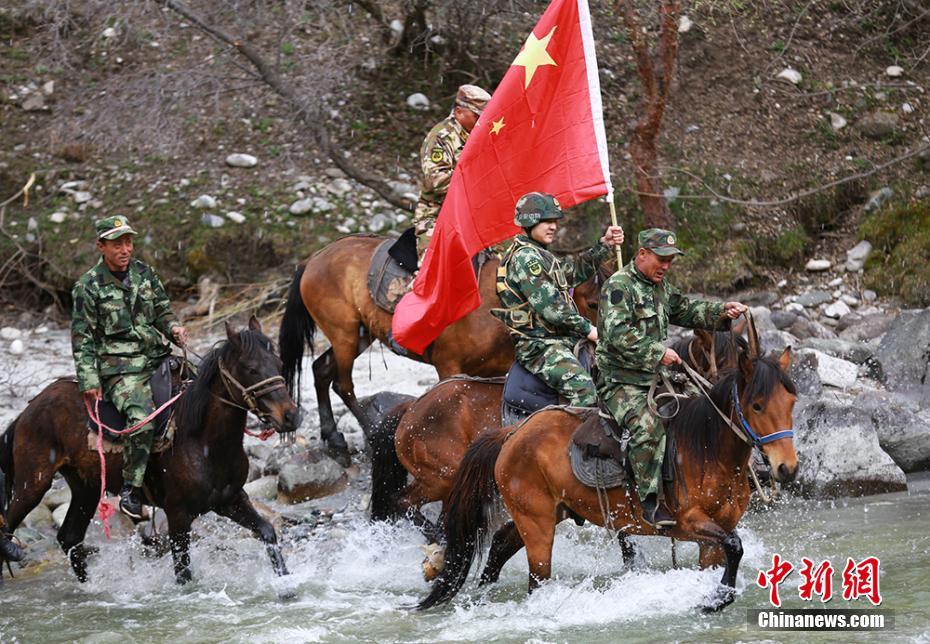 Xinjiang armed police patrol border on horseback