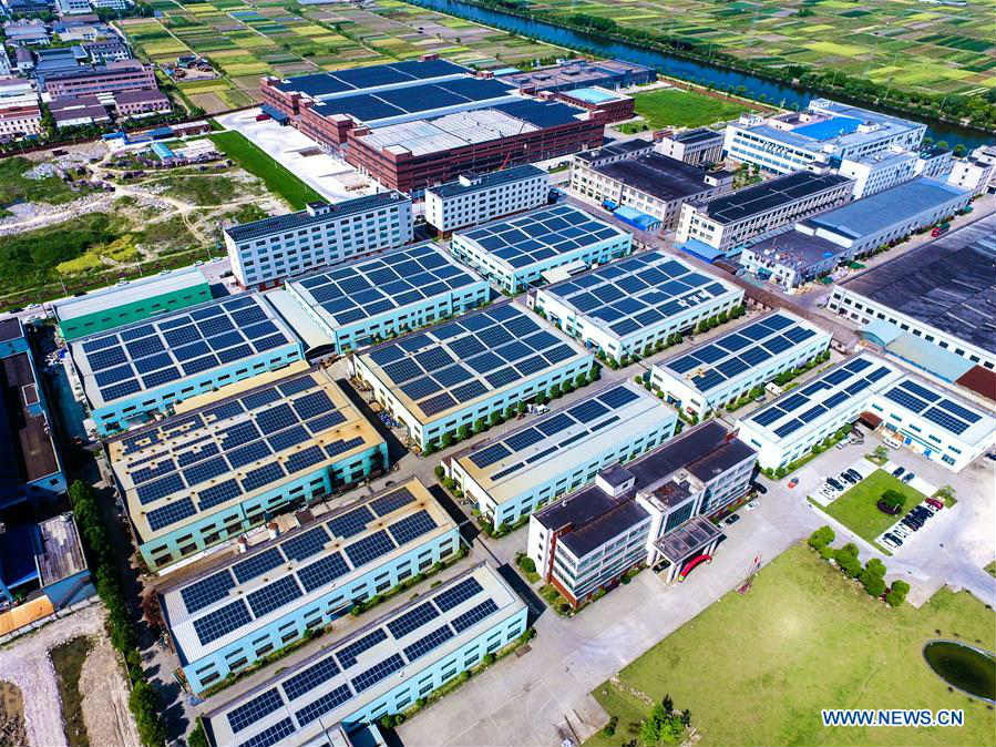 In pics: solar energy equipment on roof in E China