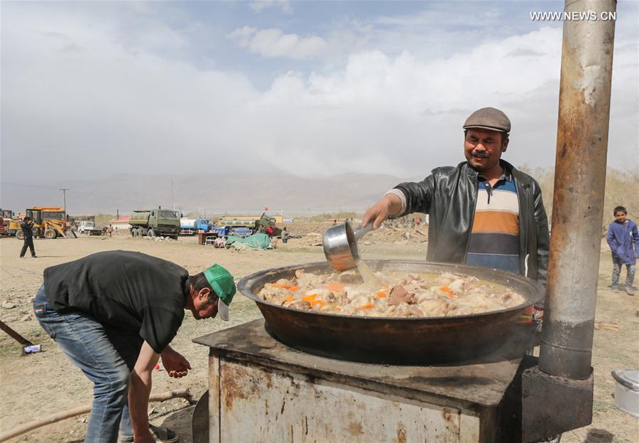 Rescuers work at quake-hit county in NW China's Xinjiang