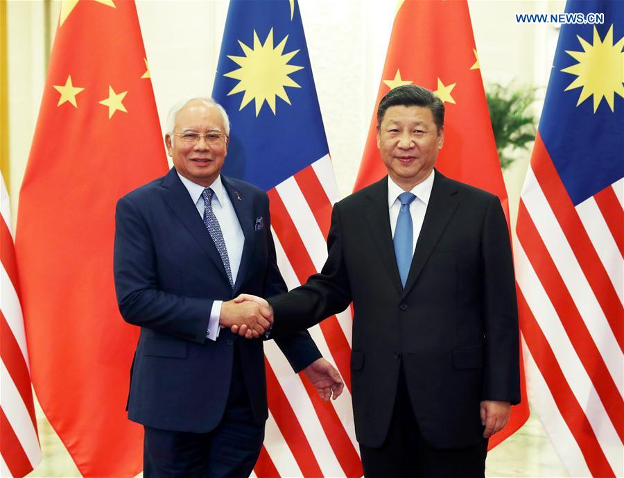 Xi praises Malaysia for Belt and Road cooperation; deals signed