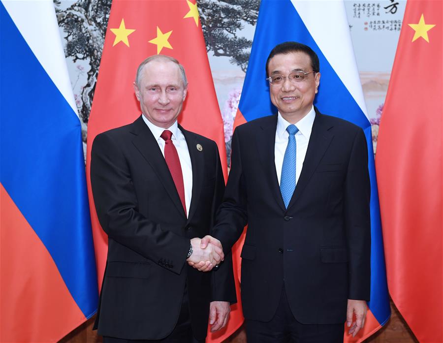 Xi says China, Russia play role of 