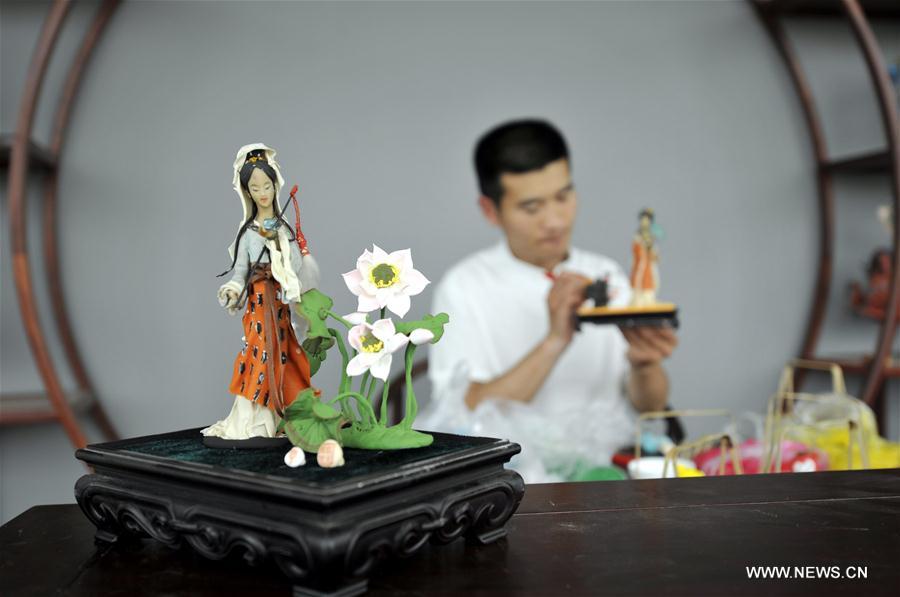 Dough figurines made by folk artist in E China