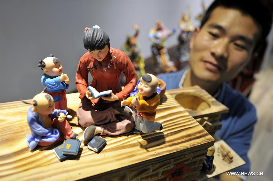 Dough figurines made by folk artist in E China