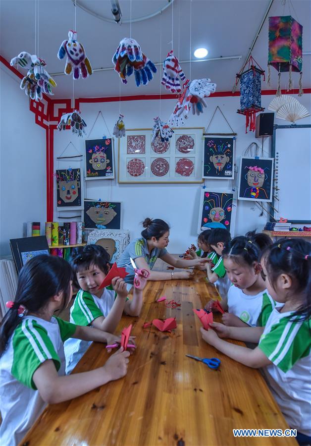 Children attend intangible cultural heritage activity in E China