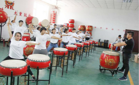 French students channel the art of drumming