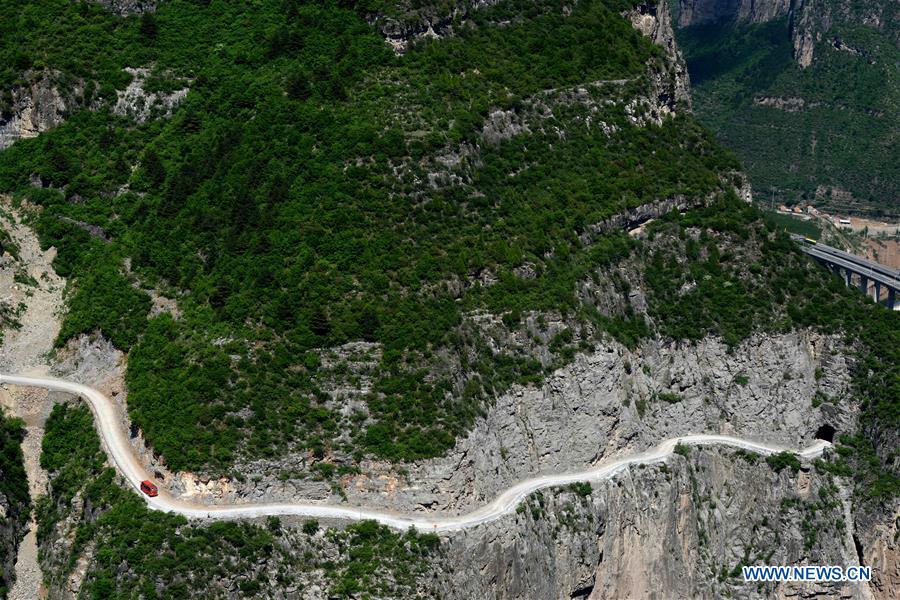 In pics: road on cliffs of Taihang Mountain in N China