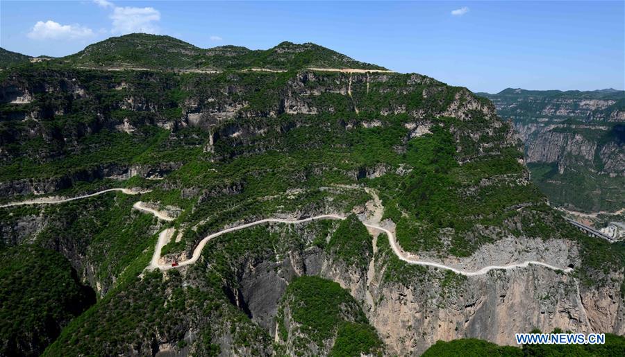 In pics: road on cliffs of Taihang Mountain in N China